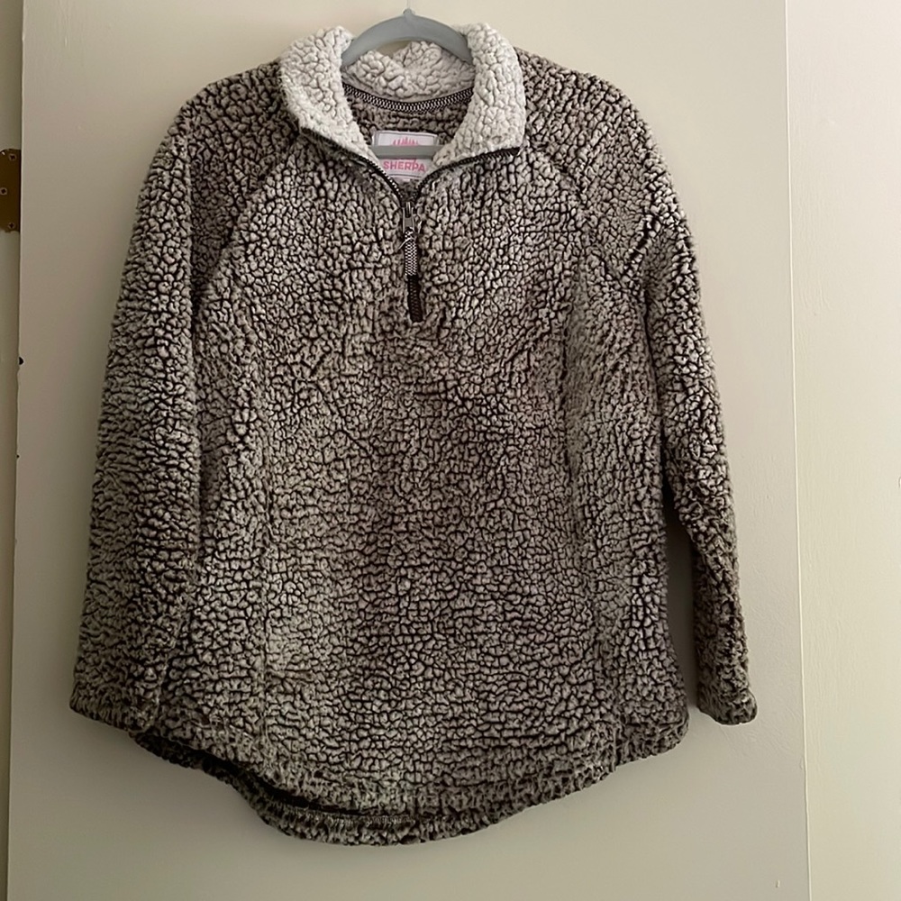 Cozy Sherpa brand quarter-zip pullover.